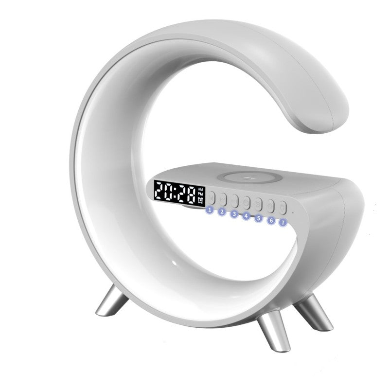 Lámpara LED Inteligente G-Shaped 4 en 1 – Luz Ambiental + Bocina Bluetooth + Cargador Inalámbrico + App Control ORVIA