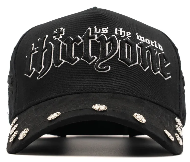 🧢 Gorra ThirtyOne “31 vs The World” – Edición Aniversario con Detalles Metálicos